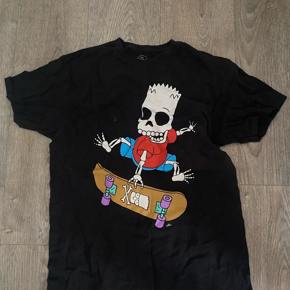 Black T-Shirt with Cartoon Skater Graphic